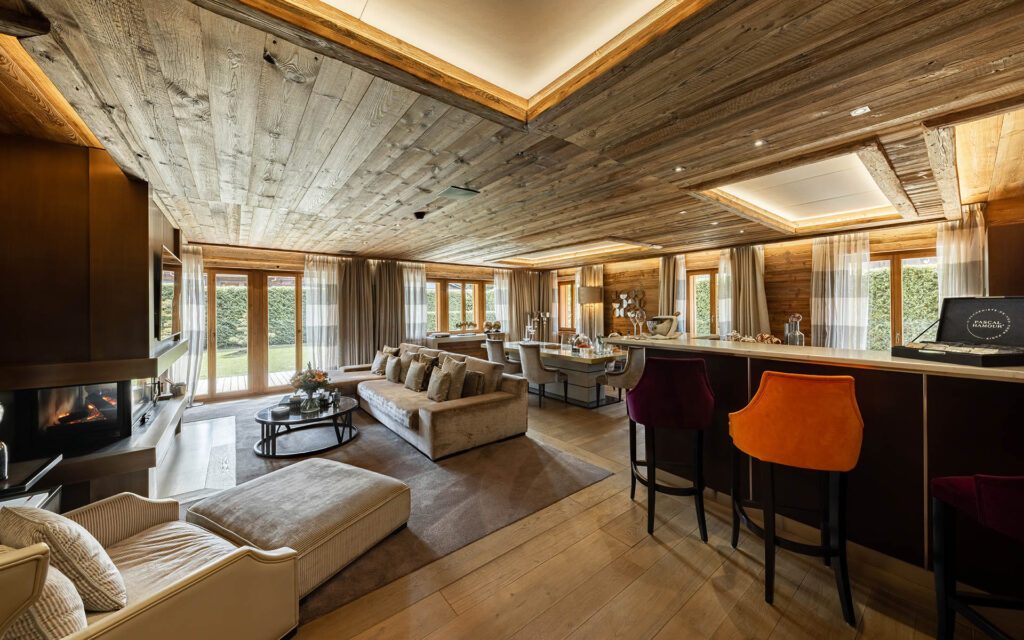 Open Living   Dining Space with Bar Three Bedroom Residence Ultima Gstaad