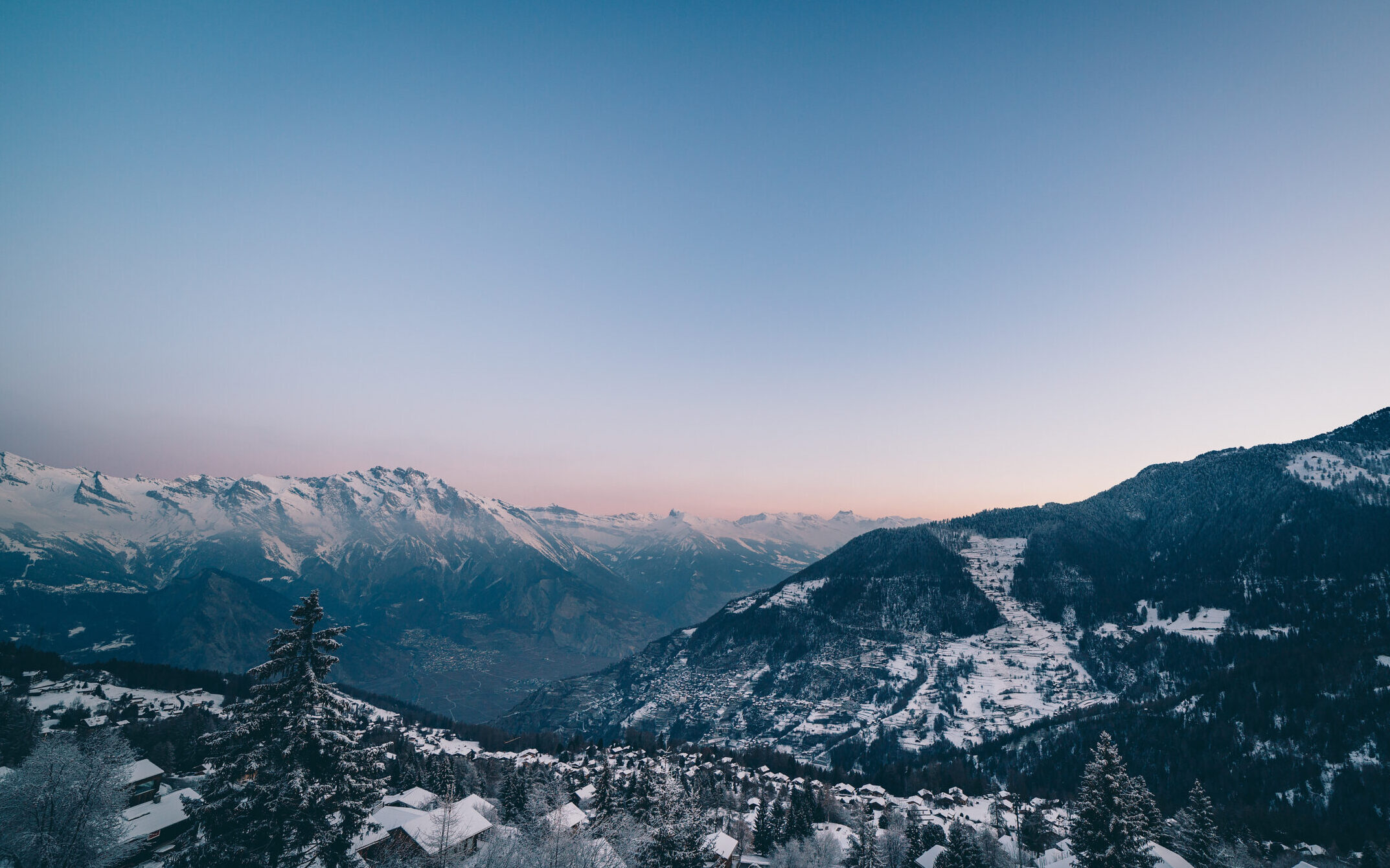 The swiss alps village of La Tzoumaz at dawn in winter, Valais, Switzerland.